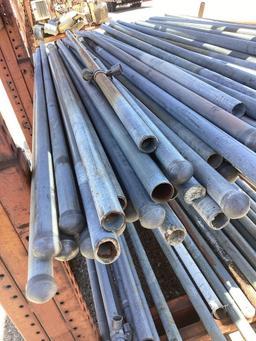 Shelf lot of assorted steel pipes