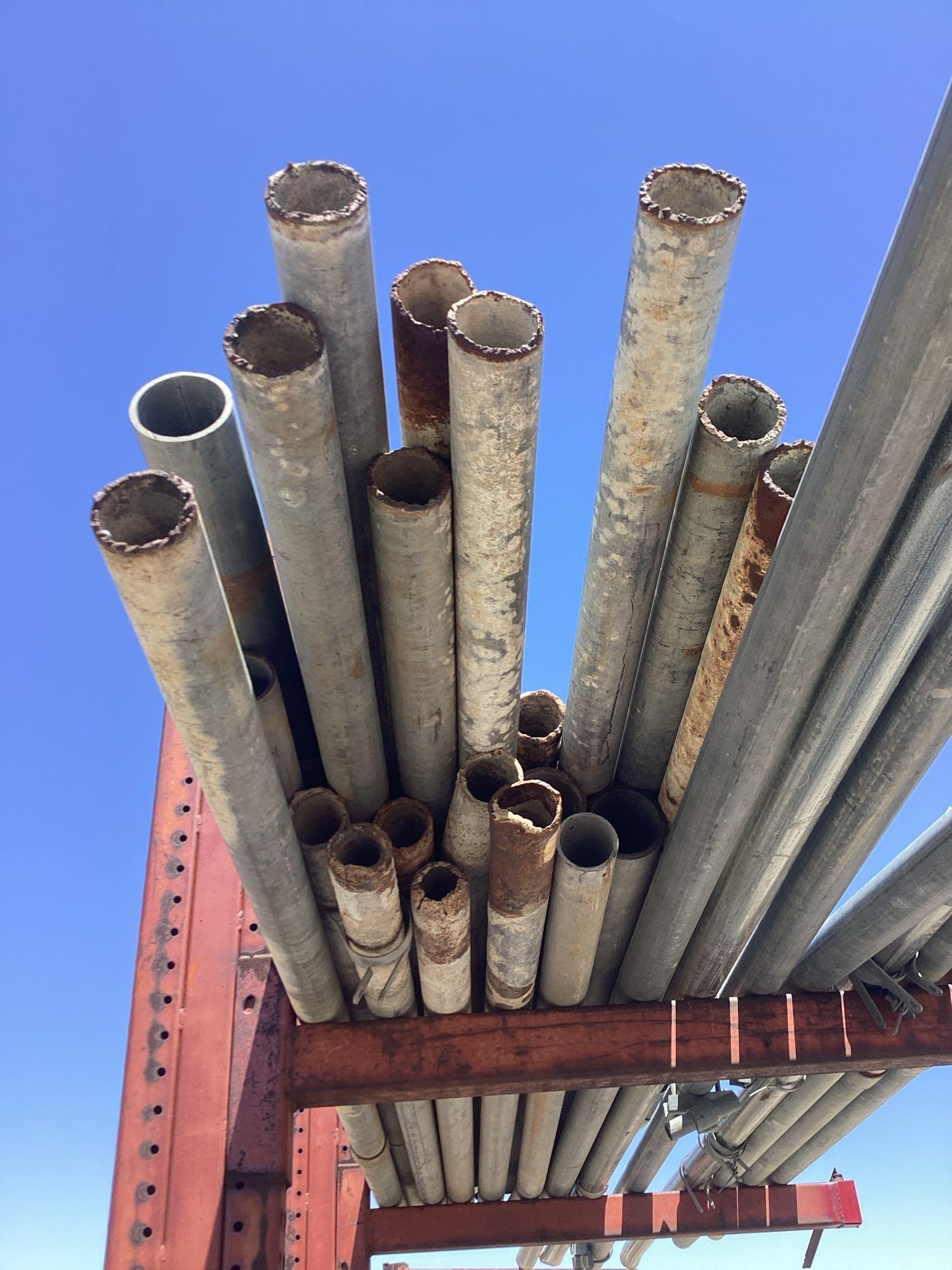 Shelf lot of assorted steel pipes