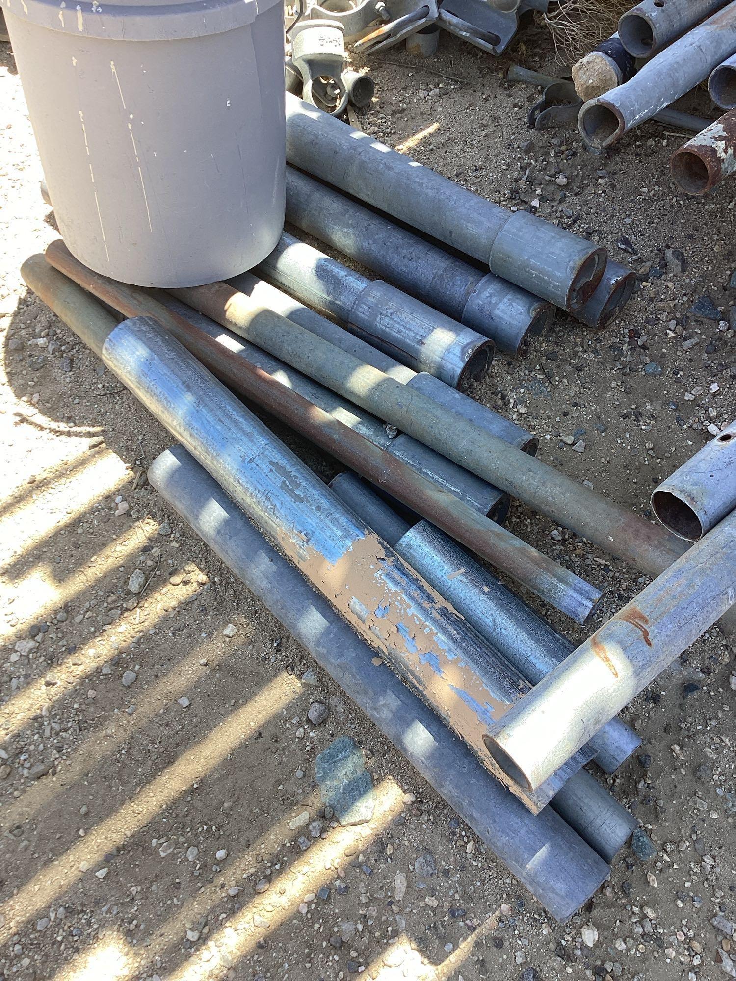Shelf lot of assorted steel pipes