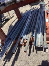 Shelf lot of assorted steel pipes