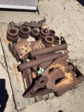 Pallet lot of assorted skid steer parts