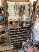 Lot of battery plug adapters and battery charger