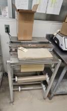 Heat/Seal Film Wrapper on Stand with Extra Roll of Film