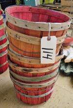 Stack of 12" red bushel baskets