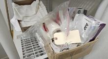 Assortment of Aprons, Plastic gloves, hairnets, twine, etc.