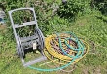 Hose Reel & Assortment of Garden hose