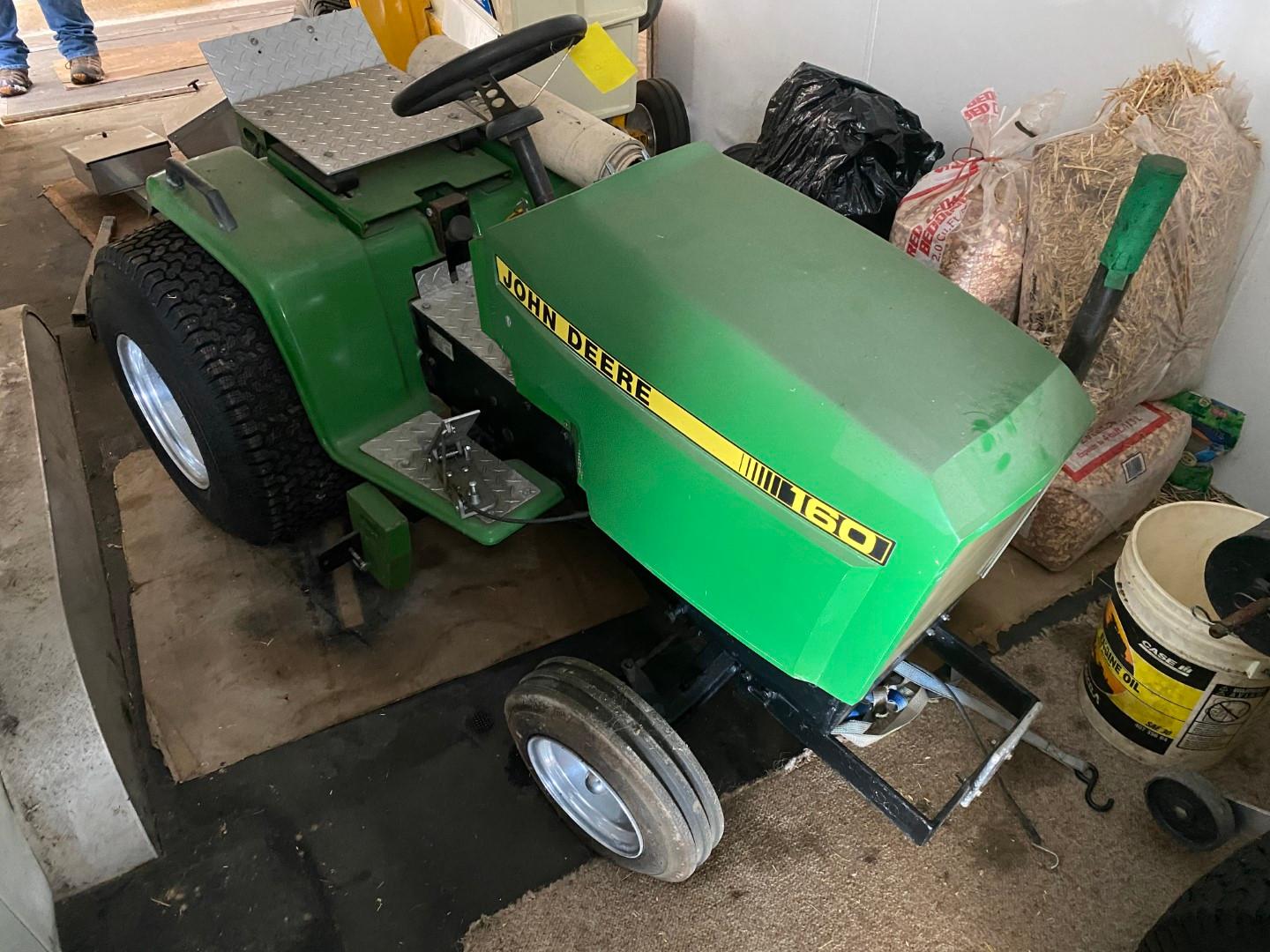 John Deere 160 w/skid plates & wts. This was a successful puller in the 1000-1100# class.