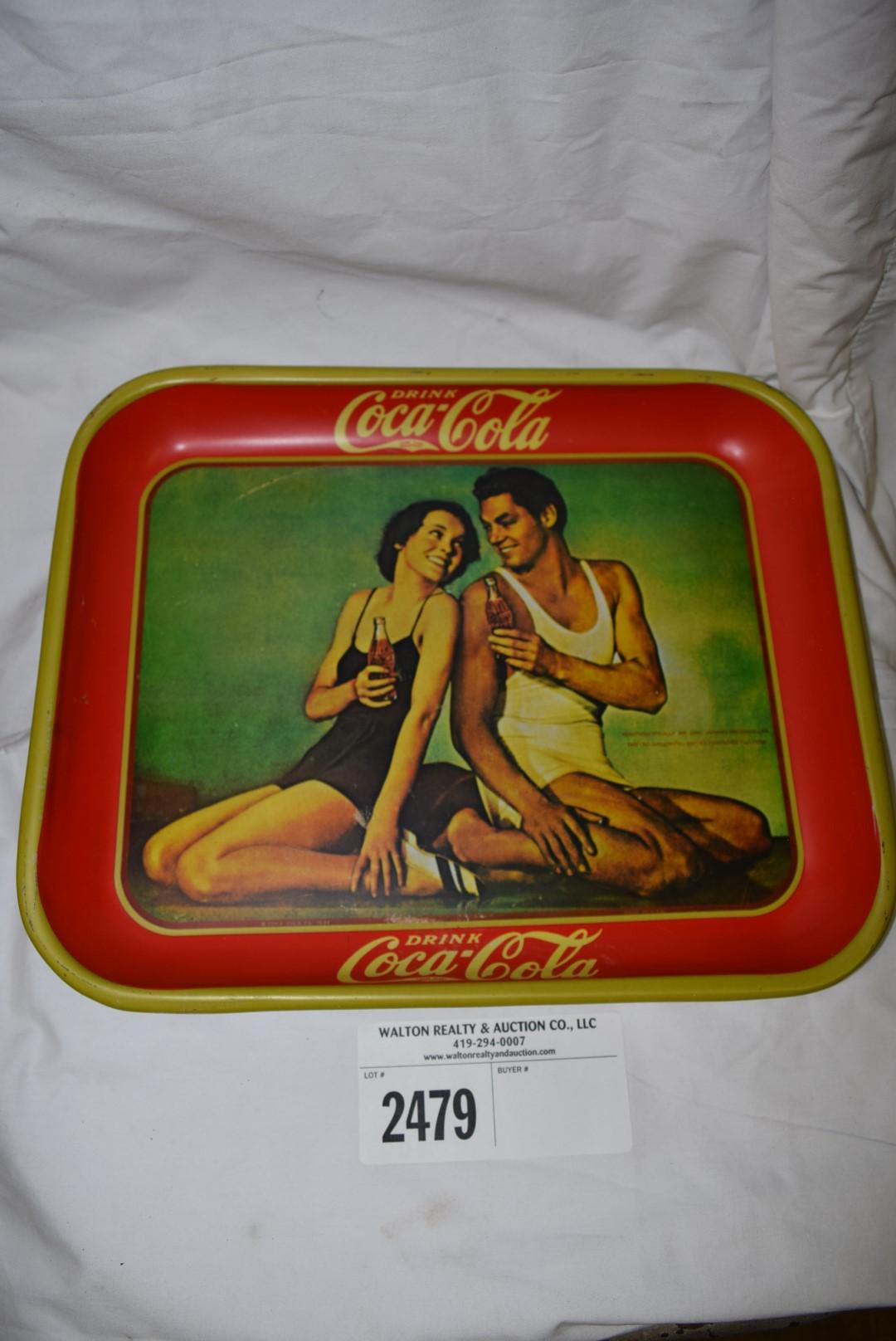Coca Cola tray metal 10 1/2" x 13 1/4" (man & woman)