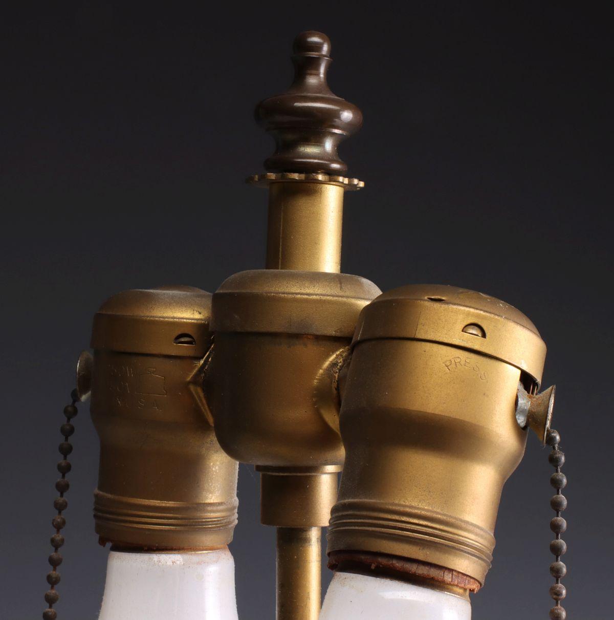 A POTTERY LAMP WITH NUDE FIGURES SIGNED OLIVE KOOKEN