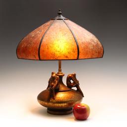 A POTTERY LAMP WITH NUDE FIGURES SIGNED OLIVE KOOKEN