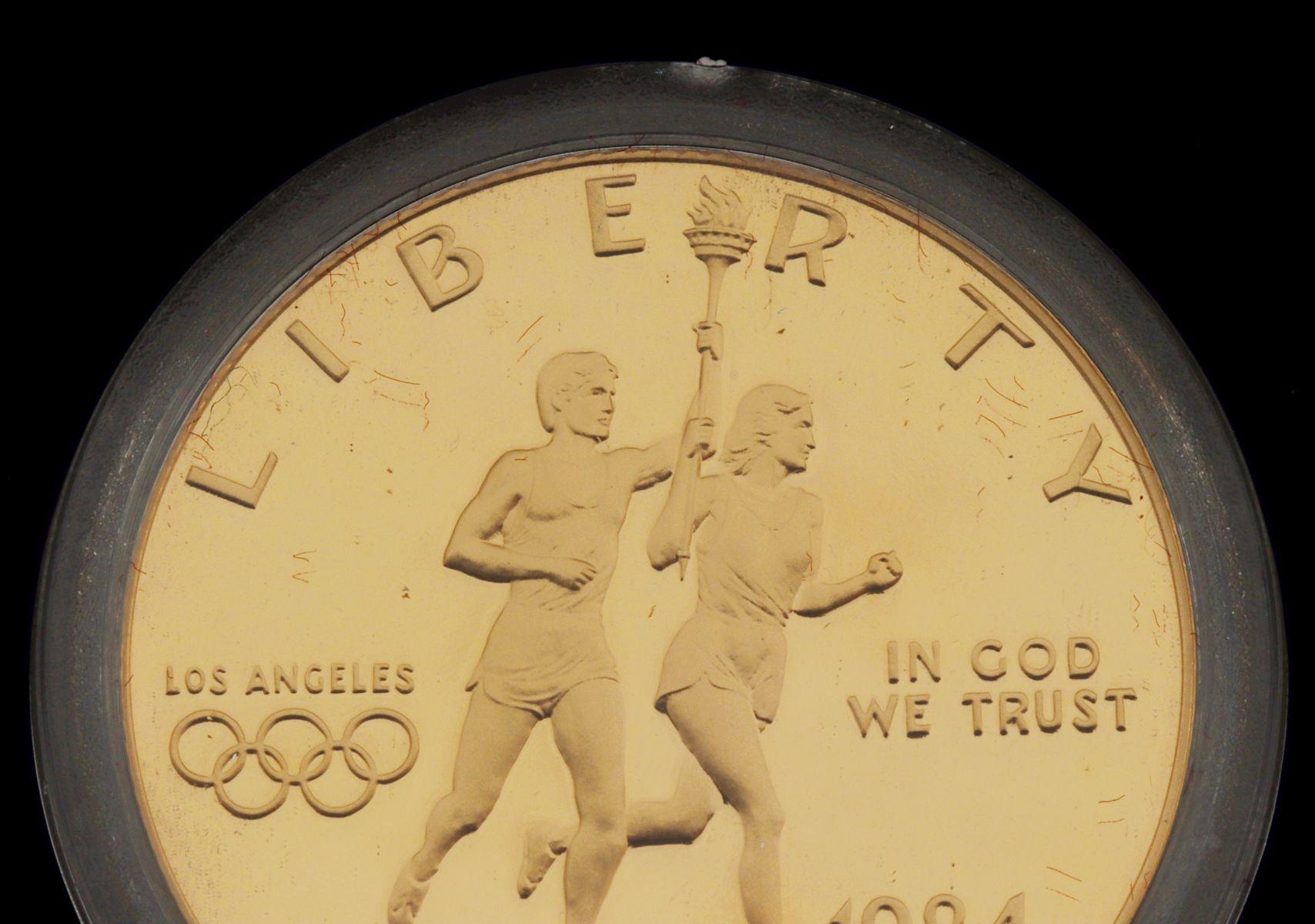 A U.S. MINT 1983-1984 OLYMPICS COMMEMORATIVE COIN SET
