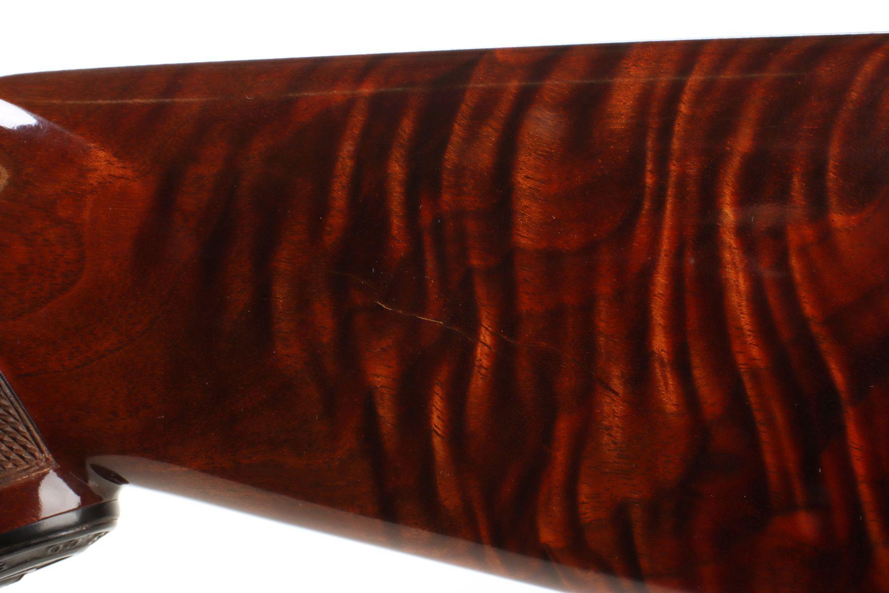 A CLEAN WINCHESTER 16 GAUGE MODEL 12 WITH GREAT WOOD