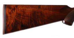 A CLEAN WINCHESTER 16 GAUGE MODEL 12 WITH GREAT WOOD