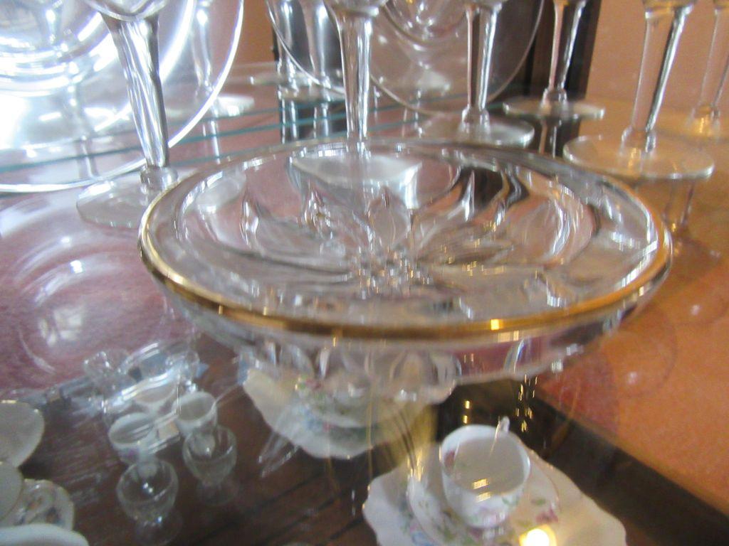 GOLD-RIMMED STEMWARE, POINSETTIA BOWL, AND PLATES