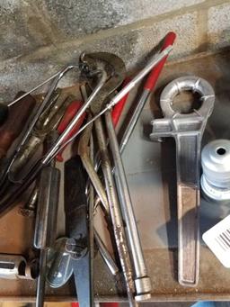 Mechanics Tools including battery terminal cleaner. Stethoscope. Tie rod separator. Brake spring