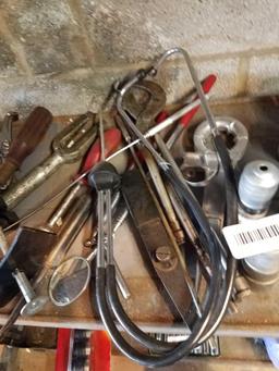 Mechanics Tools including battery terminal cleaner. Stethoscope. Tie rod separator. Brake spring