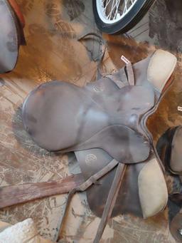 leather saddle with reflector style stirrups