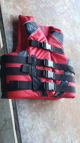 One small/medium full throttle life jacket