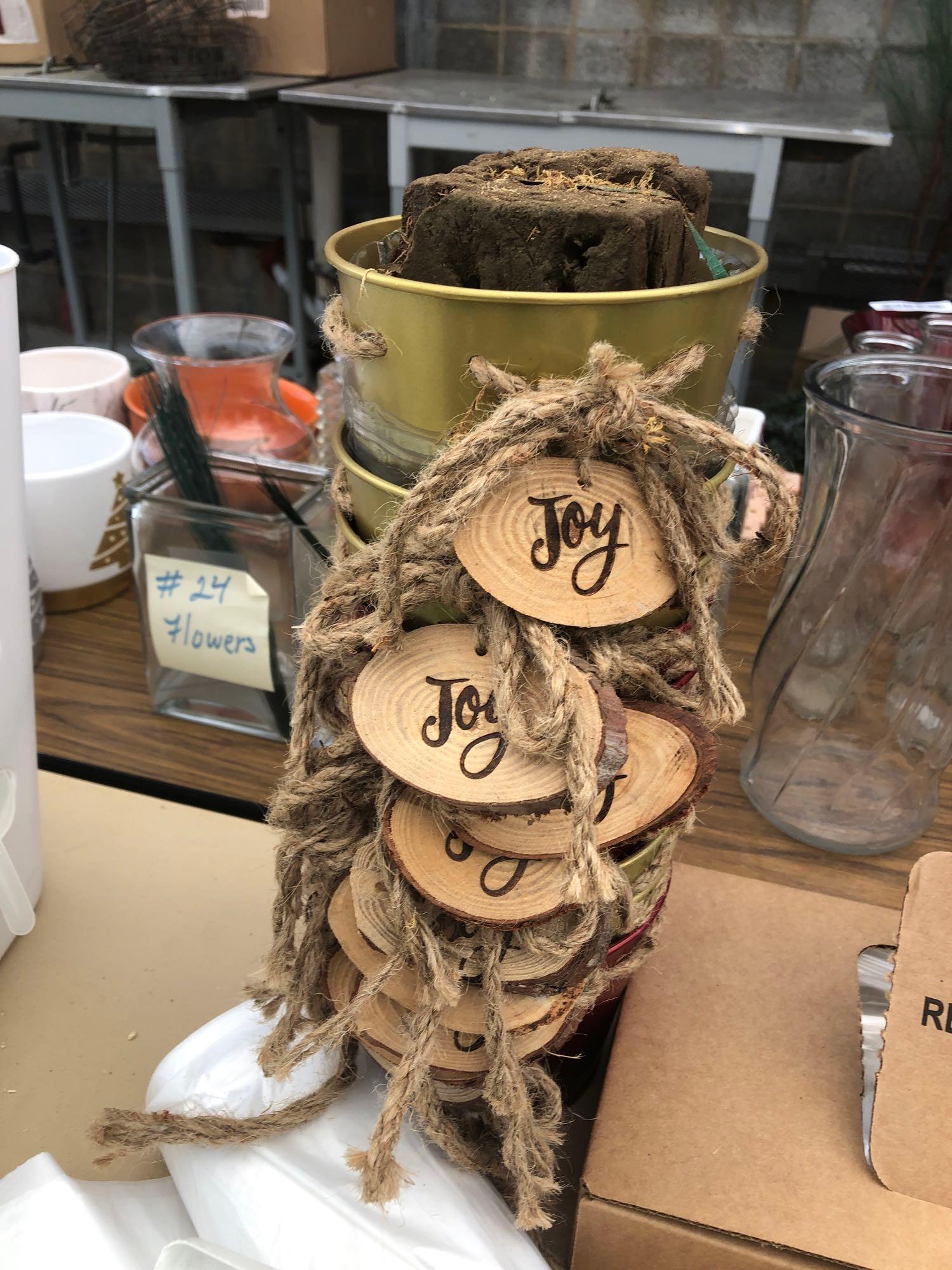 Lot of decorative items, florist items and Etc on top of table