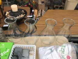 Lot of decorative items, florist items and Etc on top of table