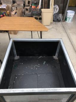 Heavy roll about cabinet with glass front