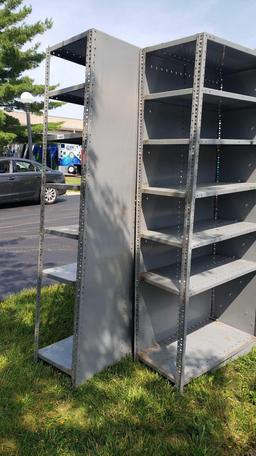 Two sets of metal adjustable shelving units. Approximately 7 ft tall by 3 ft long by 1 ft 6 in deep