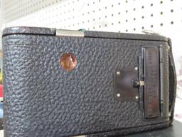Antique Kodak camera with box and booklet