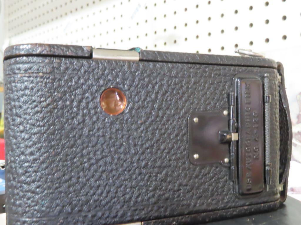 Antique Kodak camera with box and booklet