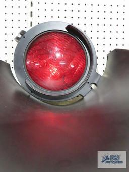 Railroad lamp signal with red shade