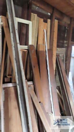 Lot of wooden trim and lumber in garage