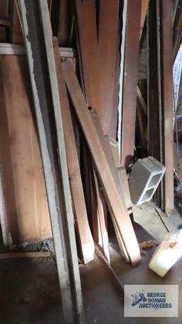 Lot of wooden trim and lumber in garage