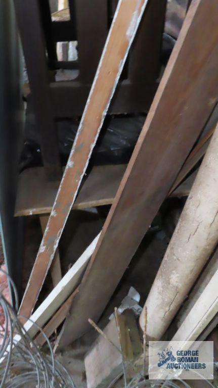 Lot of wooden trim and lumber in garage