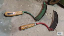 Two vintage hand scythes