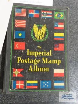 Stamp book with assorted stamps and the New Waterford Bank Vintage checkbook