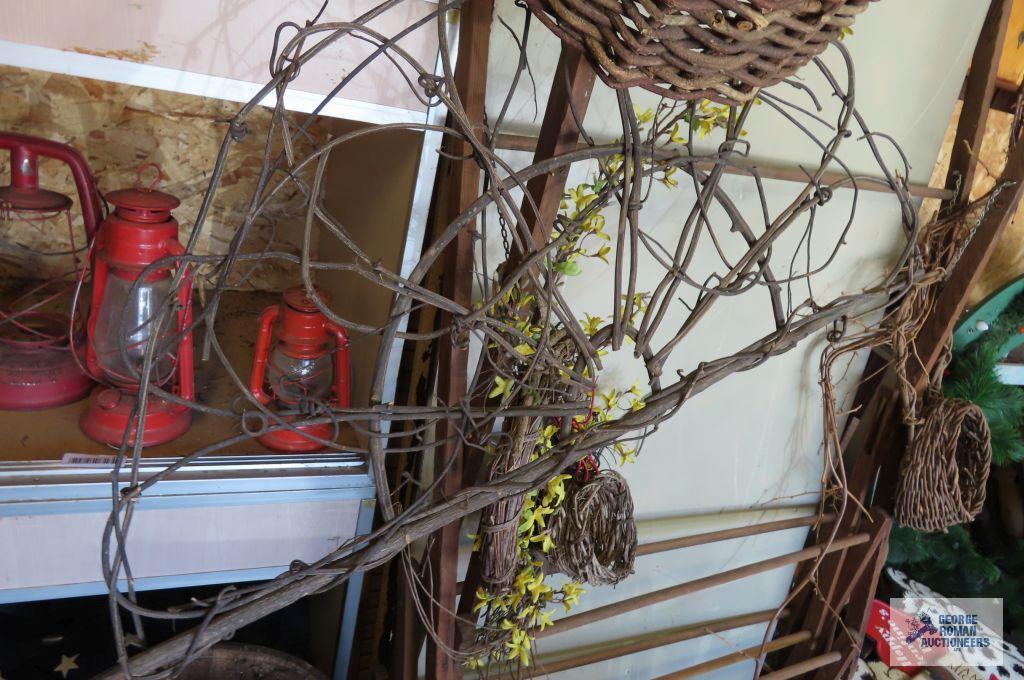 Drying rack with assorted wreaths and etc