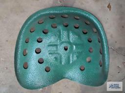 Metal tractor seat