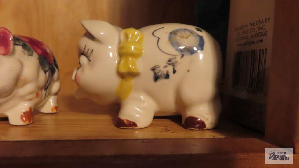 Two piggy banks, one marked Japan