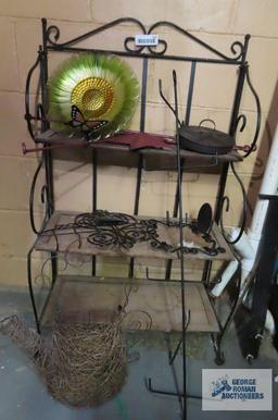 Metal shelf with assorted decorative items