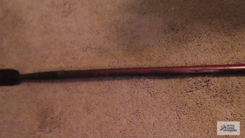 Wood and metal spear with hanging elements