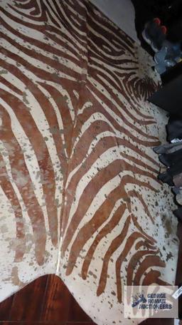 Animal hide area rug