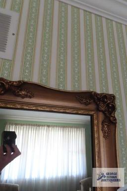 Ornate framed mirror