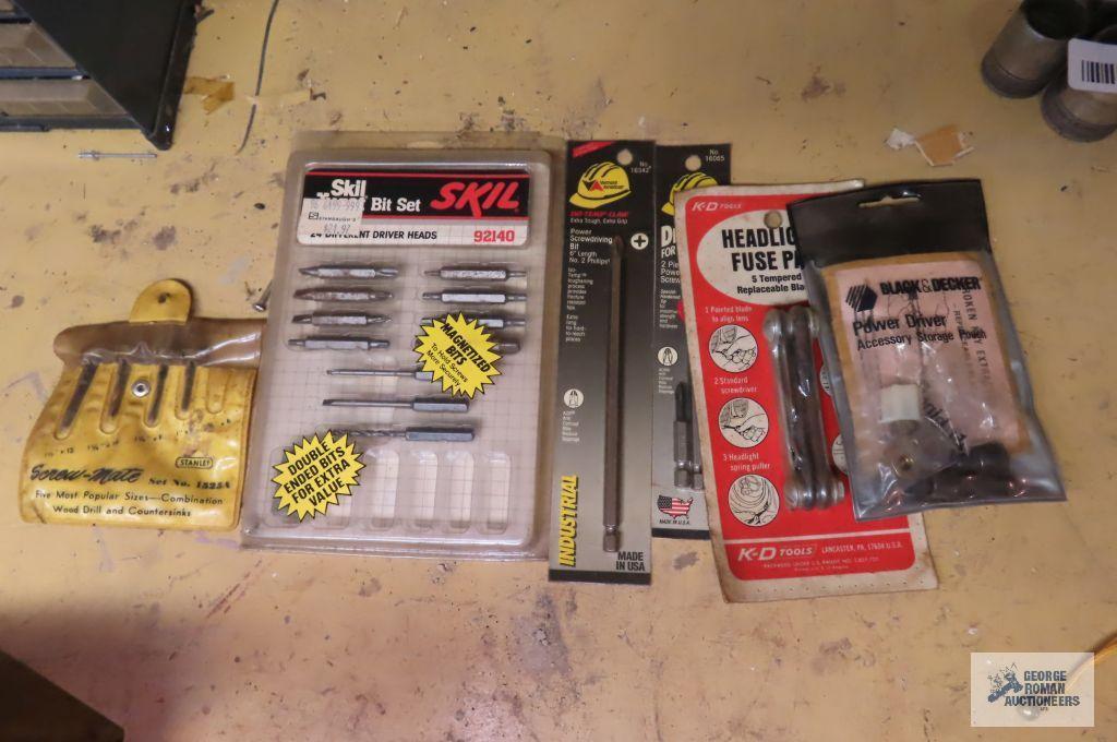 lot of bits, headlight fuse pack tool, etc