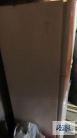 Whirlpool refrigerator, in basement, bring help for removal