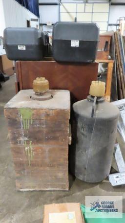 Two vintage chemical bottles. One of them has the original crate