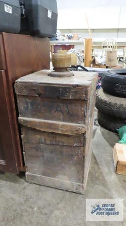 Two vintage chemical bottles. One of them has the original crate