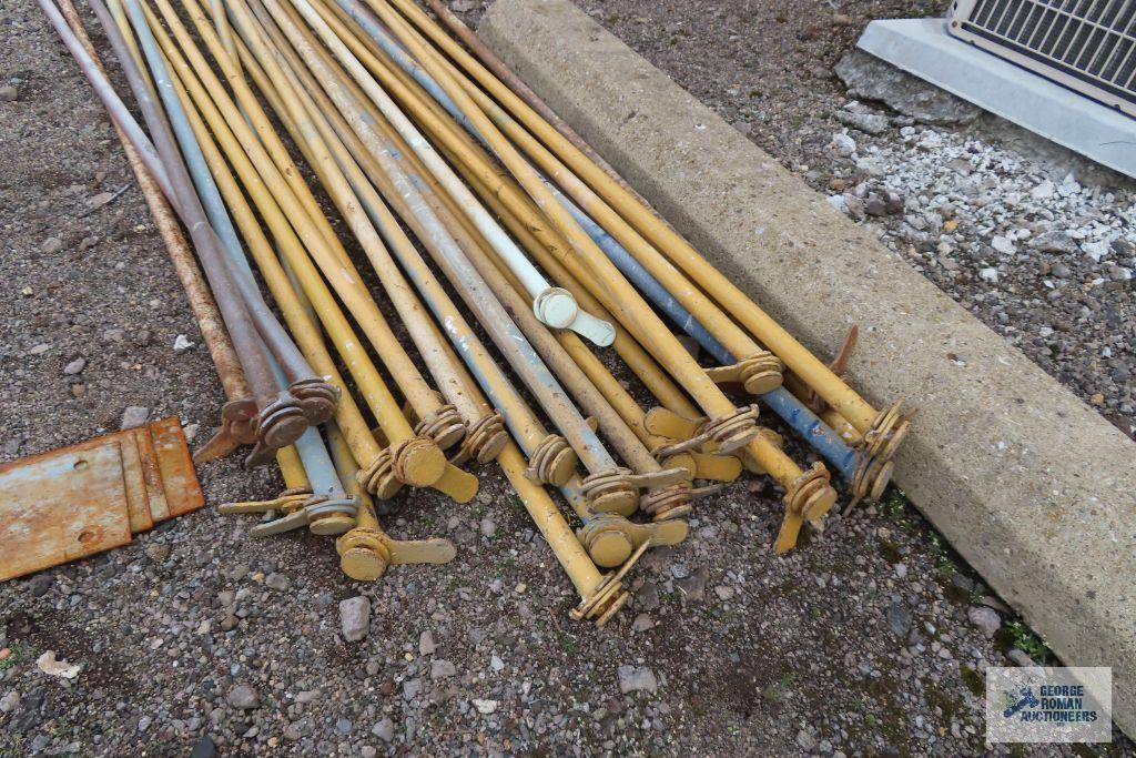 Lot of yellow scaffolding pieces