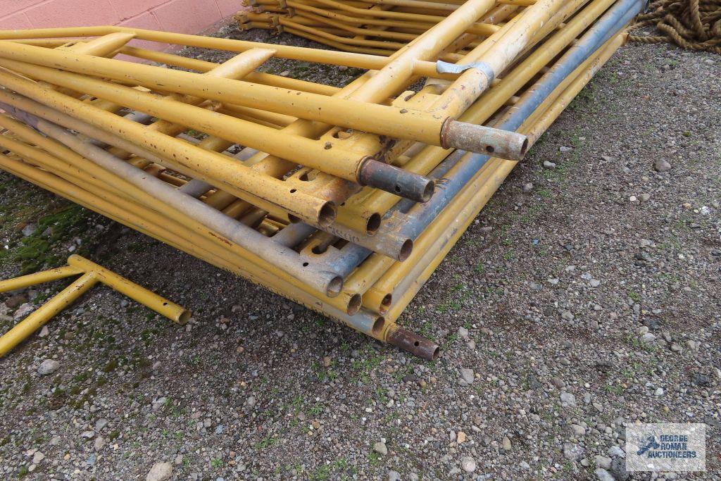 Lot of yellow scaffolding pieces