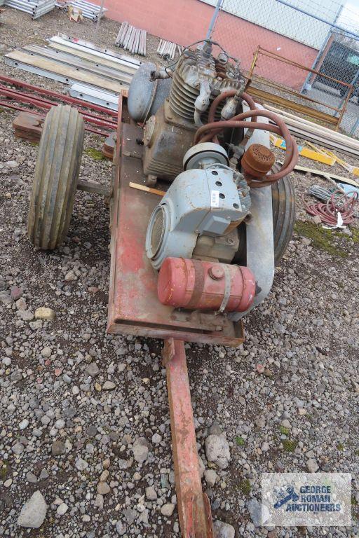 Heavy duty gas air compressor mounted on heavy duty trailer. Kohler engine