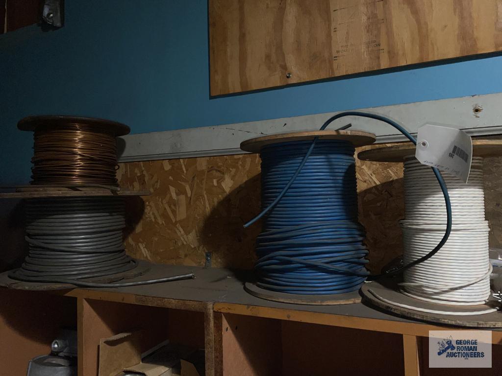 FOUR SPOOLS OF COPPER WIRE