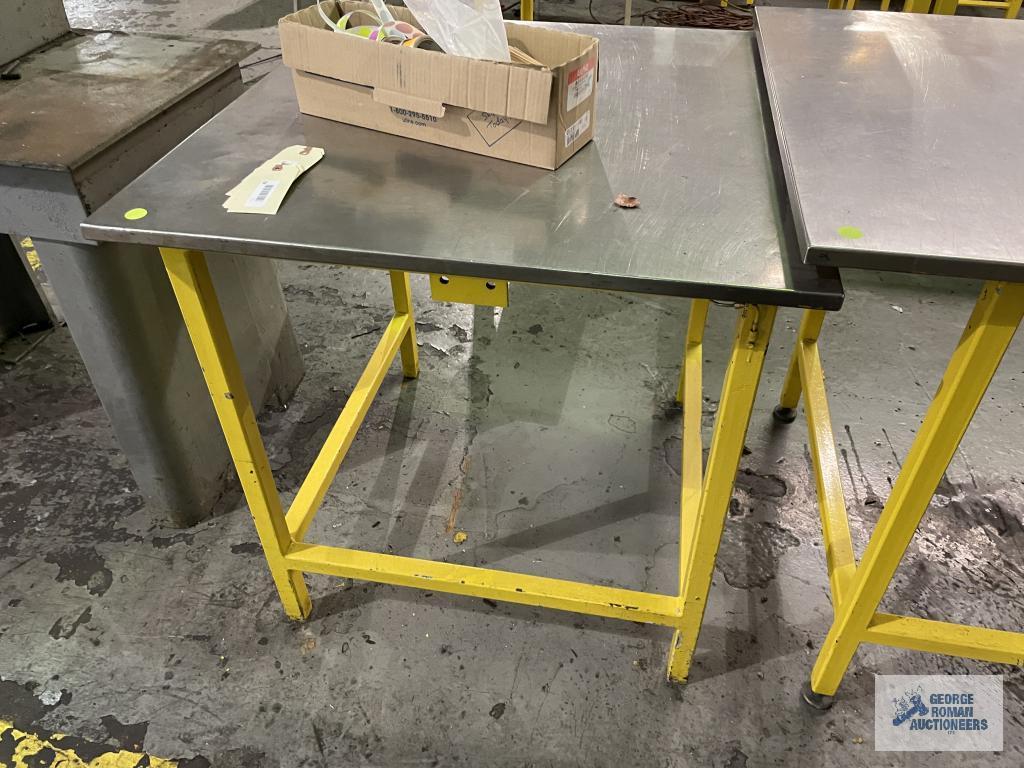 (4) STEEL TABLES. NO CONTENTS.